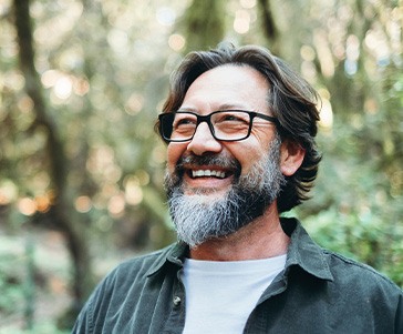 Man smiling outside